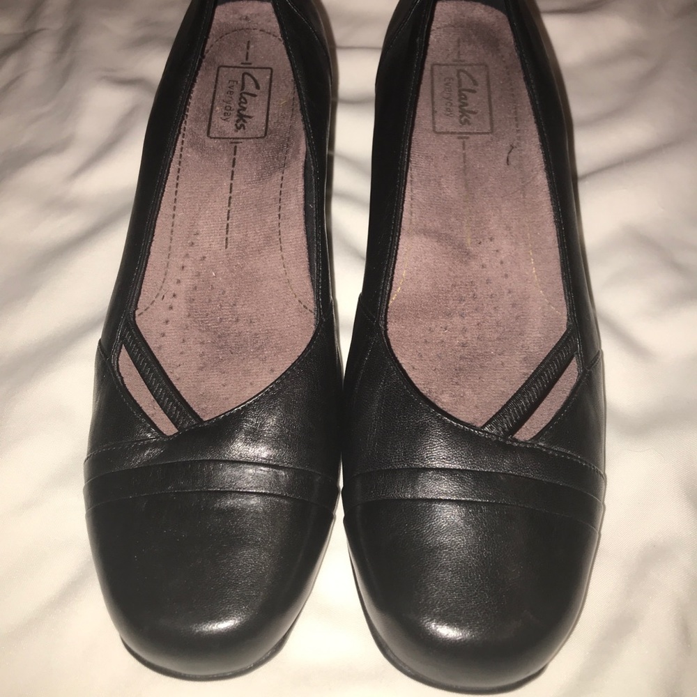 Clark’s Black Leather pumps.